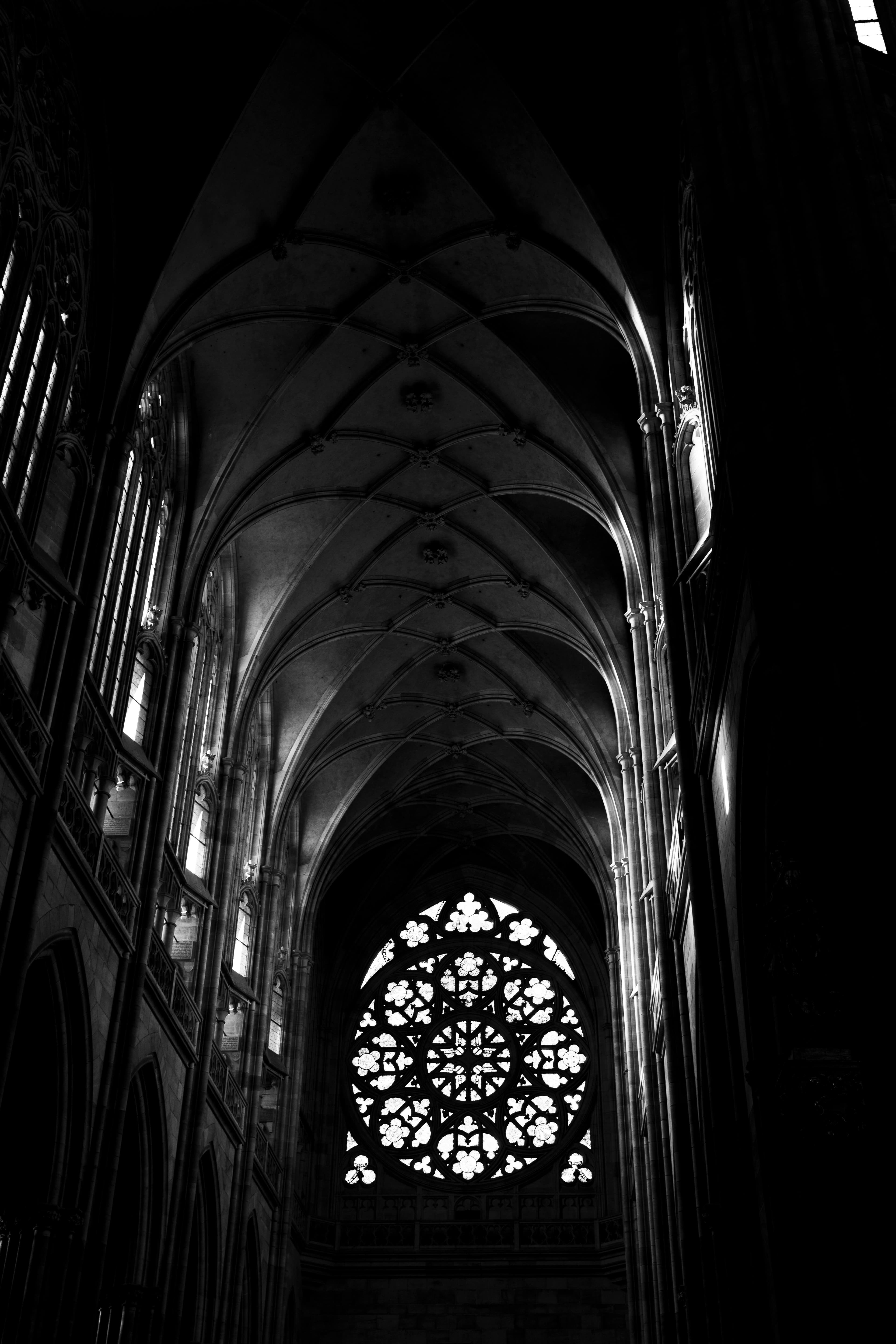 A gothic window and old stone architecture